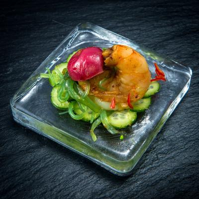 Shrimp with gooseberry chutney, marinated cucumber and seaweed salad